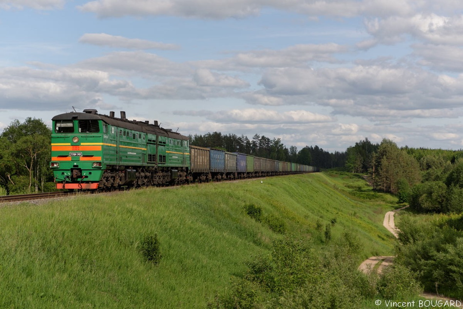 La 2TE10M 3450 près de Vīpe avec un train de fret en provenance de la Biélorussie et à destination de Rīga. 37_3450_Vipe&Lettonie_Fret_2TE10M_20140531.jpg